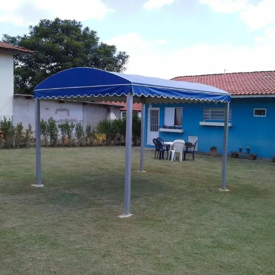 Reforma de Toldos e Coberturas em Guarulhos SP Reforma de Toldos e Coberturas em Guarulhos SP — Cobertura em quintal residencial coberto