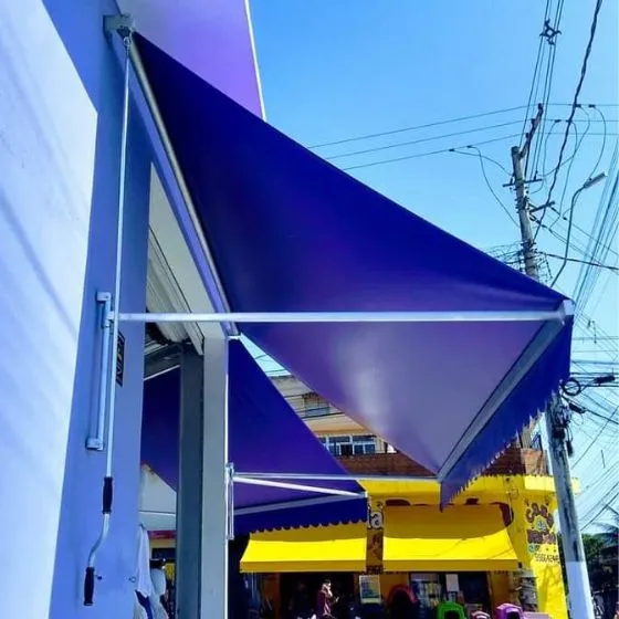 Toldo Cortina com Braços Laterais em Guarulhos SP Toldo Cortina com Braços Laterais em Guarulhos SP — Instalação em garagem residencial