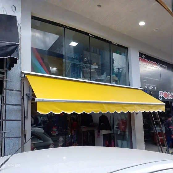 Toldo Cortina com Braços Laterais em Guarulhos SP Toldo Cortina com Braços Laterais em Guarulhos SP — Cobertura em quintal residencial coberto