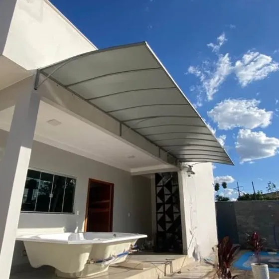 Toldo Fixo de Lona PVC em Jardim Mediterrâneo, Guarulhos SP Toldo Fixo de Lona PVC em Jardim Mediterrâneo, Guarulhos SP — Instalação em garagem residencial