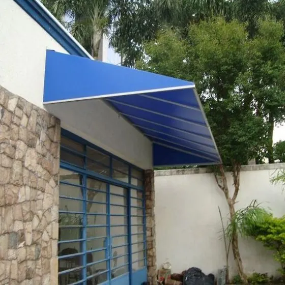 Toldo Fixo de Lona PVC em Jardim Mediterrâneo, Guarulhos SP Toldo Fixo de Lona PVC em Jardim Mediterrâneo, Guarulhos SP — Cobertura em passagem coberta entre ambientes