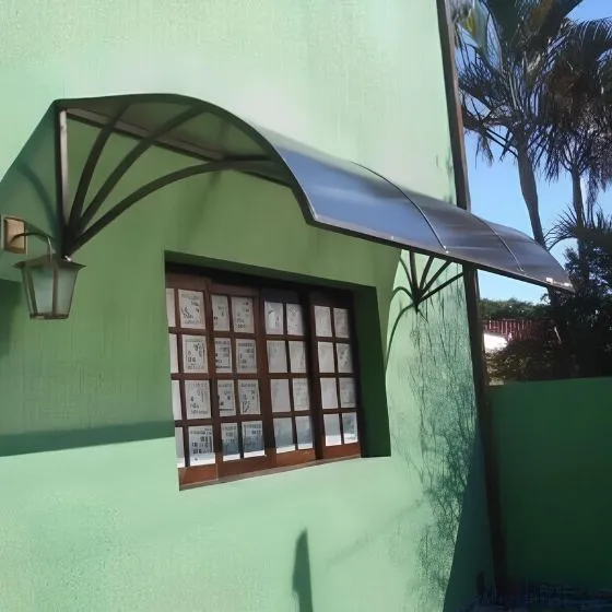 Toldo Policarbonato Alveolar em Guarulhos SP Toldo Policarbonato Alveolar em Guarulhos SP — Cobertura com calha lateral para escoamento